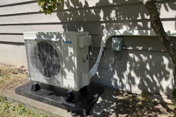 Daikin Ductless Outdoor Unit on Composite Mounting Pad Daikin ductless outdoor unit installed on a composite mounting pad by Dave's Heating.